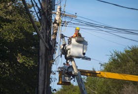 
Linemen work on restoring power on Inglis Street in Halifax on Tuesday morning, Sept. 10, 2019. - Ryan Taplin
