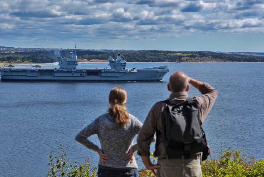 
 The British aircraft carrier HMS Queen Elizabeth was popular with observers as it exited Halifax Harbour on Monday following its weekend visit in Halifax. - Tim Krochak 
