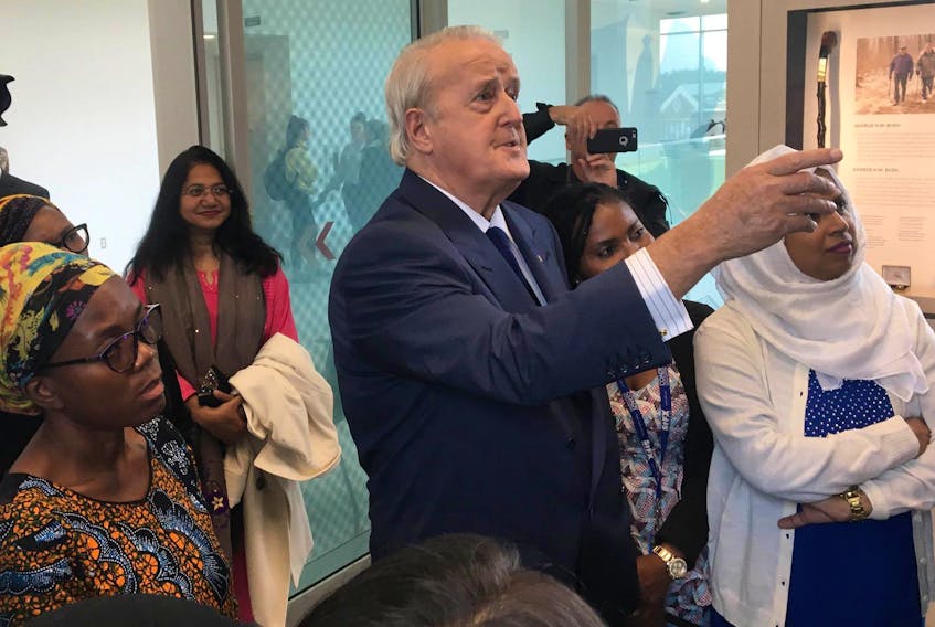 Brian Mulroney meets with people at St. Francis Xavier University on Tuesday afternoon.