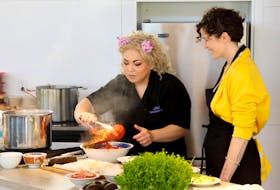 
Chef Ilona Daniels demonstrates preparing lobster. 
