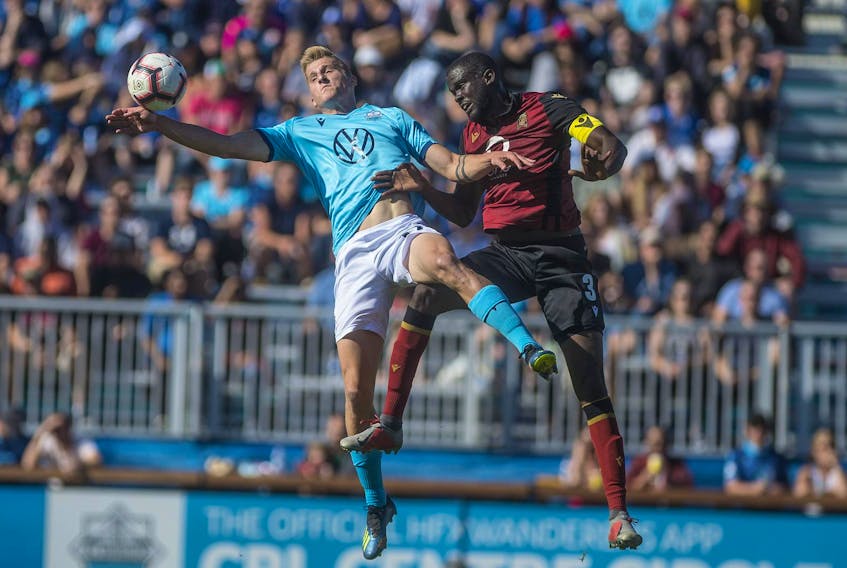 
HFX Wanderers FC striker Tomasz Skublak, left, and Valour FC defender Skylar Thomas vie for the ball during Saturday afternoon’s 0-0 draw at the Wanderers Grounds. (Ryan Taplin /The Chronicle Herald)
