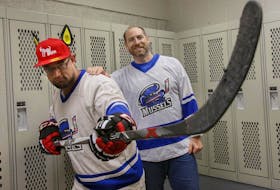 
Halifax Mussels players Tristan Laan (left) and Chuck Dauphinee, the team founder, in a dressing room in Halifax. The team was created with the aim to provide a safe space to all LGBTQ+ hockey players and allies. TIM KROCHAK/ The Chronicle Herald

