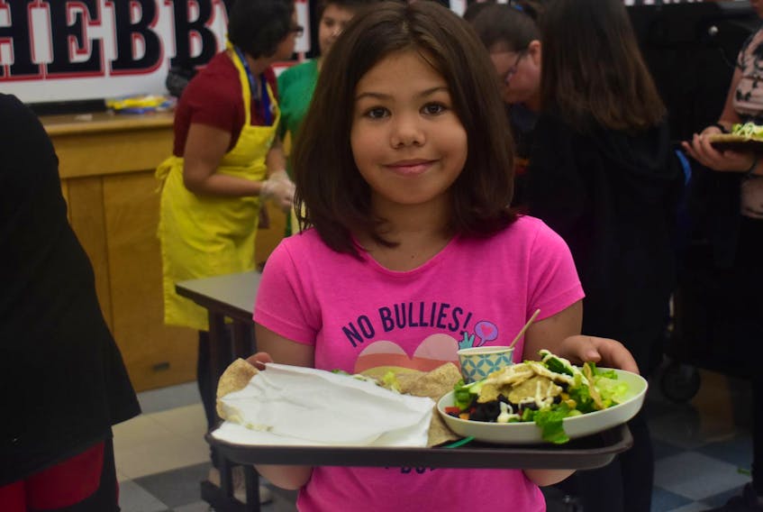 
Hebbville Academy students line up Wednesday, Sept. 25, 2019 at their school’s newly launched salad bar, becoming the fifth school in the South Shore Regional Centre of Education to pilot the project. - Josh Healey
