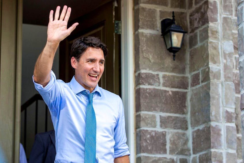 
Prime Minister Justin Trudeau waves to supporters after speaking at an election campaign stop in Brampton, Ont., on Sept. 22. - Carlos Osorio/Reuters
