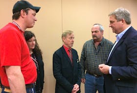 From left, David Chatman, Krista Chatman, Merv Wiseman and Dwight Eveleigh chat with Fisheries and Land Resources Minister Gerry Byrne at the Newfoundland and Labrador Federation of Agriculture AGM on Jan. 31.