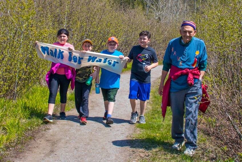 Pictured from left are Olivia Rogers, Braden Blackwood, Noah Williams, Jason Keating and H.A.V.E cofounder Gerard Feltham walking near the beginning of Ken Diamond Memorial Park on Friday, June 8 for the Glovertown Academy Grade 5-6 Walk for Water fundraiser.