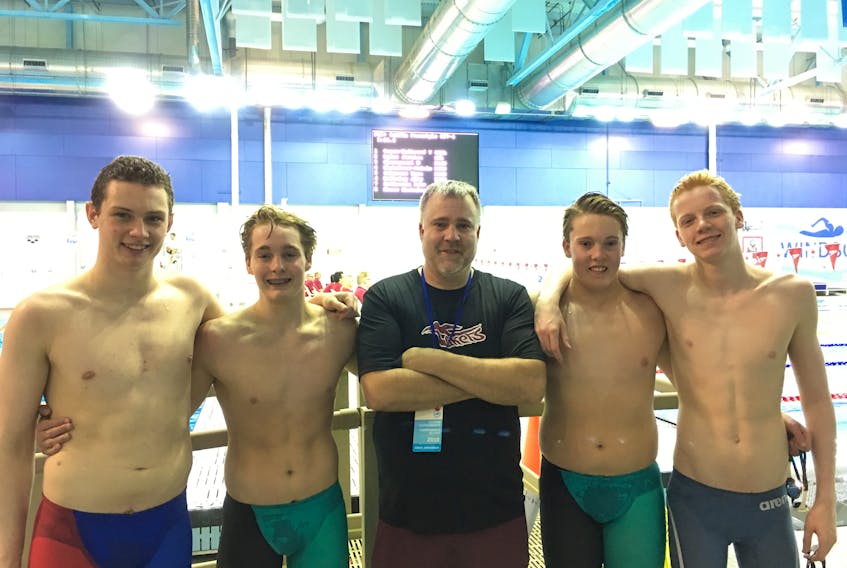 Four Gander Lakers travelled to Windsor, Ontario, to compete in Eastern Canadian National swim meet during the weekend of April 12-15. Each swimmer competed individually and as part of a relay team. The team, pictured, from the left, Dylan Morawski, Noah Rowsell, coach Tim Rowsell, Nick Rowsell, and Ewan Maclean, set a new club records in 4x200m free relay (8:51.67), the 4x100m (4:28.79) and the 4 x100m free (3:56.71).