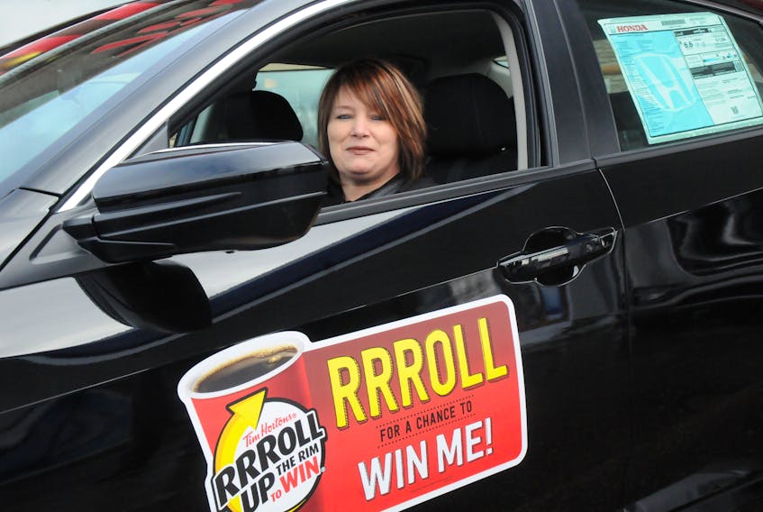 Gander’s Lisa Feltham was the winner of the 2018 Honda Civic Sedan EX-T grand prize in this year’s Tim Hortons RRRoll Up the Rim contest. It was one of 50 cars given away in the contest.