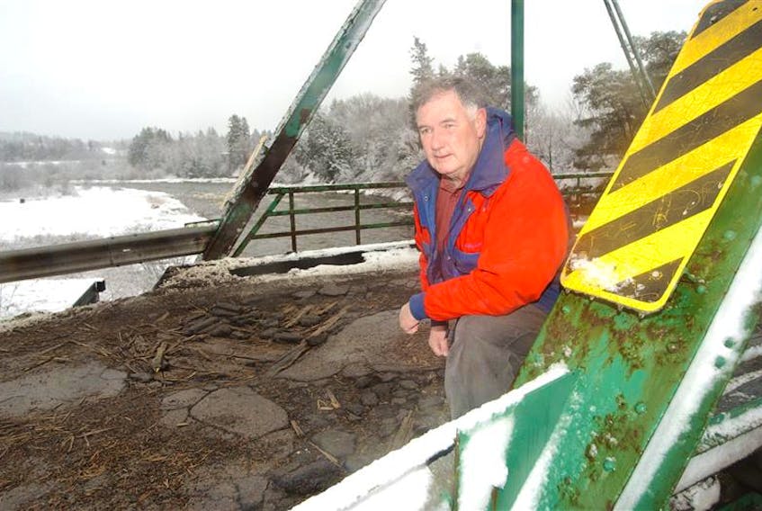 Former Colchester North MLA Bill Langille is seen in this file photo at the old Murray Siding bridge that he successfully helped fight to get replaced.