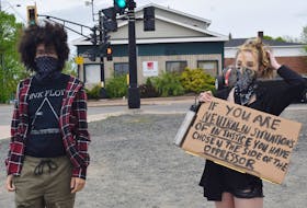 Zack Walker and Lily Whistler took part in a Black Lives Matter rally in New Glasgow on Monday.