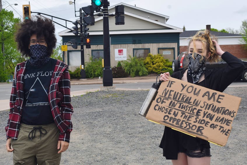 Zack Walker and Lily Whistler took part in a Black Lives Matter rally in New Glasgow on Monday.