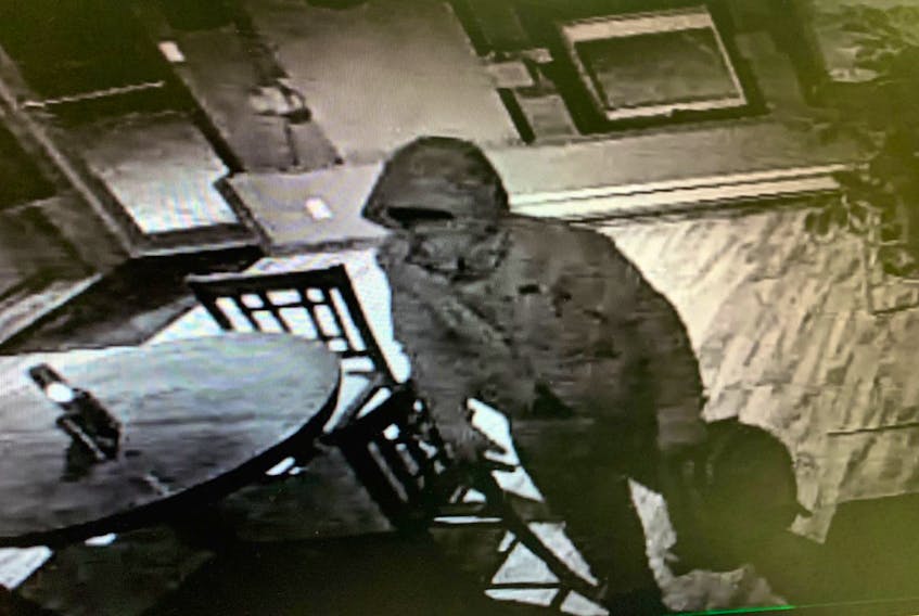 The RCMP has released a surveillance photo of a person they are trying to identify in connection with a break and enter at McGettigan's Bar and Grill in Marystown last month. - Contributed by the RCMP