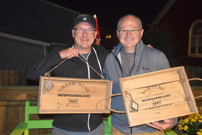 Chris Emberley, left, and John Hillier never dreamed their wooden products would get the support they have from the community. COLIN FARRELL/THE SOUTHERN GAZETTE
