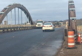 Traffic flows over the new bridge over the Nappan River. The province announced Monday the bridge will be named in honour of former Nova Scotia Premier Roger Bacon. The bridge ends a two-year detour put in place in December 2017 after the former Rainbow Bridge failed an inspection.