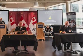 Chief of Defence Staff Gen. Jonathan Vance and Vice-Admiral Craig Baines sign the documents that officially transfer command of the Royal Canadian Navy from MacDonald to Baines on Tuesday, Jan. 12, 2021. - Royal Canadian Navy