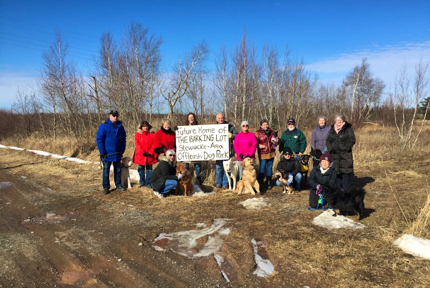 Some of the people involved in establishing an off-leash dog park in Stewiacke recently got together. Pictured are, kneeling in front, from left, Michelle Anthony and Levi, Krista Young and Ruby, and Lori Young and Tobi. Standing, Dave and Lynn Albee and Forrest, Roseanne Chapman, Kamie Branch, Craig Seafoot and Lexie, Carrie Rizok and Casey, Heather Hamilton and Chelsea, Peter Perry and Abby, Ginette Emond and Finlee, and Stewiacke Mayor Wendy Robinson.
