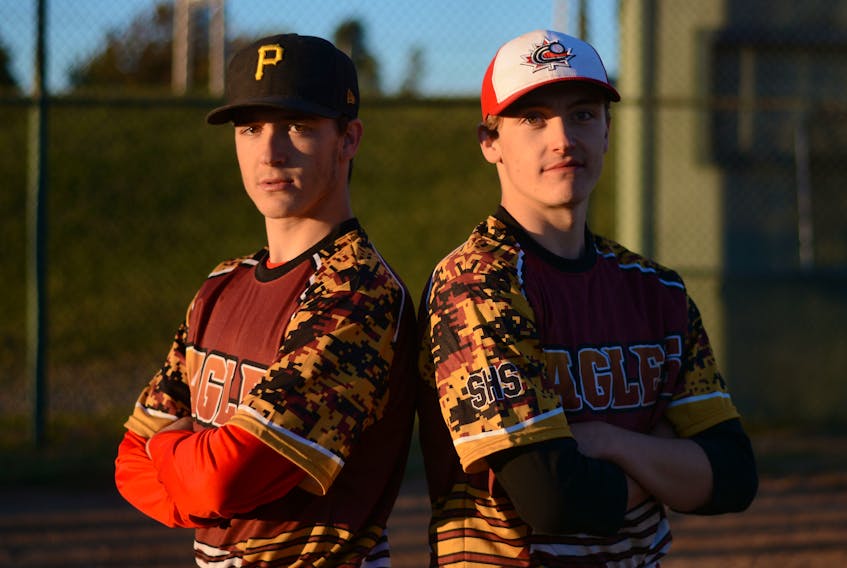Twin brothers, Mats (left) and Nate Stone, recently wrapped up their AAA minor-league baseball career with 10 championship titles between the two of them. They also play baseball with the Springhill High School Eagles.