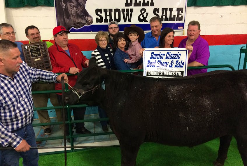 Wayne ‘Butch’ MacKenzie Auto Sales purchased the grand champion at the 31st Border Classic Beef Show and Sale on Saturday at the Amherst Curling Club.