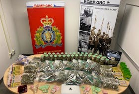 An RCMP display of a variety of cannabis products and cash that was seized Jan. 27 from a warehouse on Jennifer Drive in Bible Hill. Two men are facing a number of charges resulting from the bust.