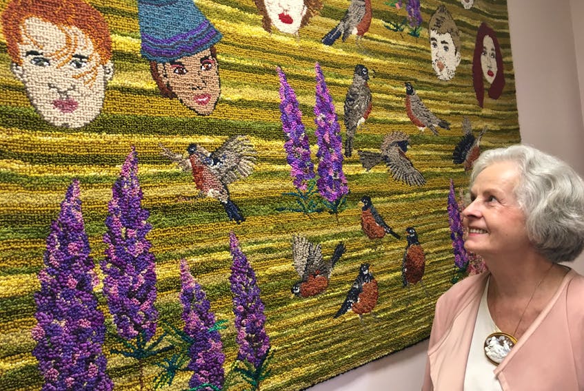 Dr. Halina Bienkowski stands next to one of the massive hooked rugs on display in the her Amherst office. The Amherst physician has become a renowned rug hooker with her rugs being featured in journals including Rug Hooking Magazine, The Medical Post and Celebration of Hand-Hooked Rugs XXII. She is the 2019 Nova Scotia Fibre Arts Festival featured artist and her hooked rugs will be displayed at the festival headquarters in Amherst town hall and during an exhibit at her office on Oct. 16 from 6:30 to 8:30 p.m.