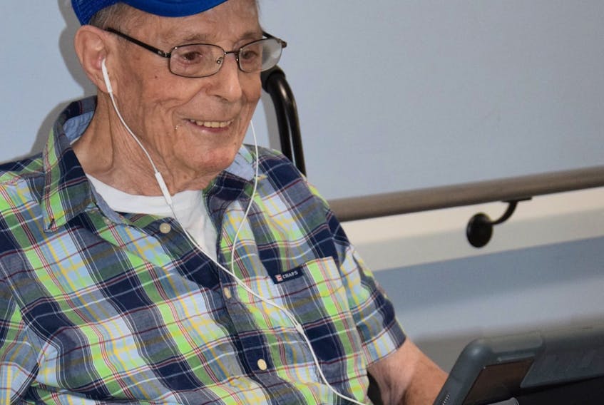 Glen Haven Manor Resident Bob Olsen enjoys regular FaceTime chats with family members and has been doing so on a very regular basis long before the global pandemic began.  It is part of his routine which he looks forward to every time.