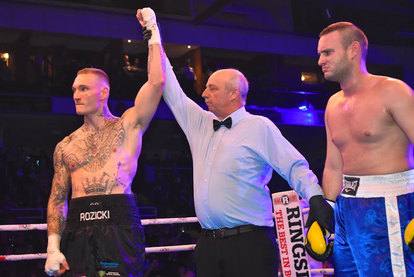 Ryan “ Thunder” Rozicki, left, is pictured above being officially declared the winner of the main event of the evening during Cape Breton’s first professional boxing match since 1988. Rozicki defeated Kristof Demendi from Slovakia in just over two minutes into the first round of the bout at Centre 200 on Saturday.
