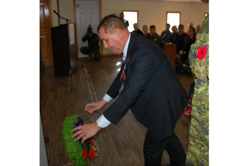 P.E.I. Senator Brian Francis places a wreath Thursday at a service held on the Scotchfort reserve to mark National Aboriginal Veterans Day.