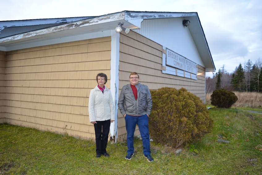 Joyce Keigan, left and Jim McNeil stand in front of the Brooks Haven Hall. The current committee of the Brooks Haven Recreation Association intends to resign in the future and is holding a public meeting on Tuesday at the hall at 7 p.m.