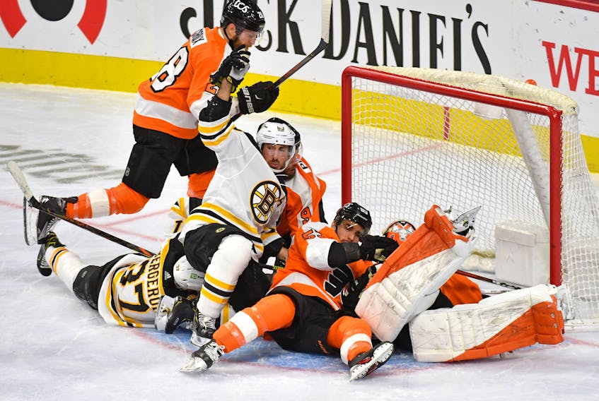 Boston Bruins forward Brad Marchand (63) celebrates his goal against the Philadelphia Flyers during the third period Friday at Wells Fargo Center in Philadelphia. The Bruins won 2-1. - Eric Hartline / USA Today Sports