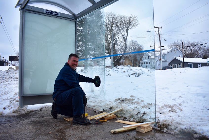 With another winter storm forecast for later in the week, Frank Power was busy Tuesday installing the walls of this Welton Street bus shelter at Ashby corner in Sydney. The Island Auto Grass and Trim Ltd. employee had several jobs on his list as part of the Cape Breton Regional Municipality’s bus shelter construction initiative. DAVID JALA/CAPE BRETON POST