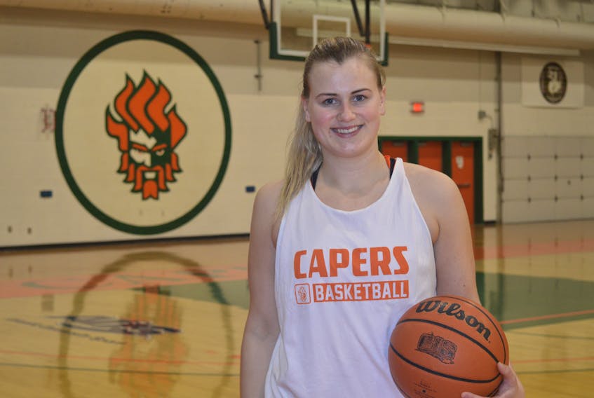 Hannah Brown, a fourth-year player with the Cape Breton University Capers women’s basketball team, above, finishes practising on Thursday night ahead of today’s Atlantic University Sports game against the visiting Dalhousie Tigers. The game will be a part of the Shoot for the Cure campaign that aims to fundraise to help women with breast Cancer. Tip off for the women’s game will be at 6 p.m. at the Sullivan Field House at Cape Breton University. The men’s team will also play Dalhousie at 8 p.m.