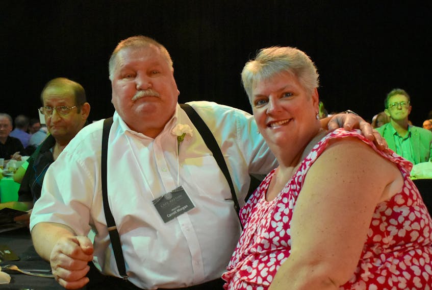 Carroll Morgan, left, and his wife Marlene Morgan poise for a photo during the annual Cape Breton Sports Hall of Fame at Centre 200 in Sydney on Friday. Morgan, an Olympic boxer and university football standout, was one of three athletes, two teams and a builder to be inducted into the sports hall of fame during the ceremony. Close to 275 people including inductees were on hand for the annual Cape Breton Sports Hall of Fame at Centre 200 in Sydney on Friday. Three athletes, two teams and a builder were inducted into the hall of fame during the ceremony.