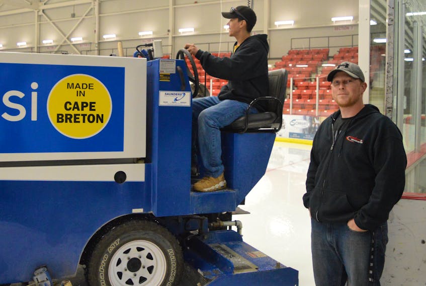 There’s no denying that Max Martin, driving the Zamboni, and Murray Jessome have cool jobs. The Membertou Sport and Wellness Centre employees had no trouble beating the heat on Wednesday as they tended to duties around the state-of-the-art facility that includes two ice surfaces.