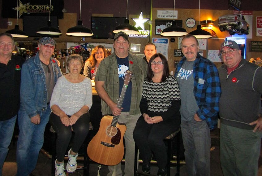 The annual Northside Christmas Daddies fundraiser will begin this weekend at Dooly’s in North Sydney. The fundraiser is in its eighth year and has raised close to $40,000 for the cause. Members of the organizing committee, from left, front row, Ward Glogowski, Bob MacDonald, Mia MacDonald, Eddie MacDonald, Brenda MacDonald, Peter MacDonald and Danny MacDonald, back row, Mia Patterson and Paul Madore. Submitted photo/Mia Patterson