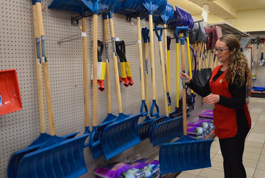 Wilson’s Home Hardware employee Nadara MacDonald checks out the Sydney store’s shovel inventory on Tuesday. The first major storm of the winter is forecast to hit Nova Scotia on Thursday with an expected snowfall of up to 30 cm in some parts of the province. DAVID JALA/CAPE BRETON POST