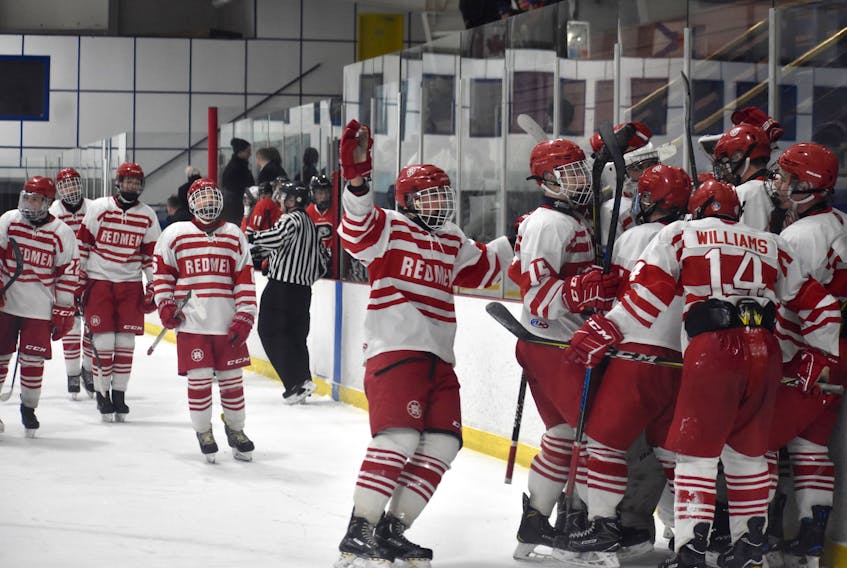 In this file photo, members of the Riverview Redmen celebrate after winning the Cape Breton High School Hockey League championship on Feb. 28 at the Cape Breton County Recreation Centre. In June, it was announced Riverview High School would be re-branding its sports team names and dropping “Redmen” from its hockey program. The school says the change won’t come into effect until next year.