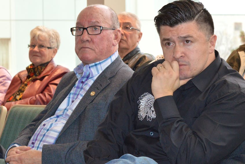 Membertou Chief Terry Paul, left, and Eskasoni Chief Leroy Denny listen closely to a CBRM council debate in this file photo. Denny, the chief of the largest First Nations community east of Montreal, is leading an initiative aimed at gaining official language status for Mi’kmaq in the province of Nova Scotia. DAVID JALA/CAPE BRETON POST