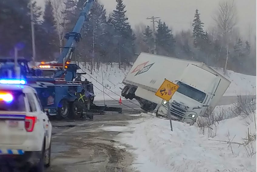 RCMP assist with a vehicle off the road near the Seal Island Bridge Wednesday morning. RCMP say there were five accidents on Highway 125 within 15-20 minutes of each other likely attributed to black ice.