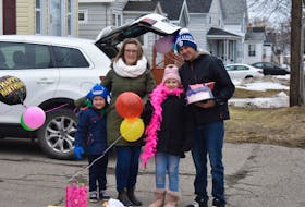 Nine-year-old Layla MacDougall, her mother Stephanie Pitchuck, her father Thomas MacDougall and her brother, Shamus MacDougall celebrated a surprise driveby birthday party for the Sydney girl Saturday afternoon. Social distancing prevented Layla from having a conventional party, so friends and family drove by their Royal Avenue home.