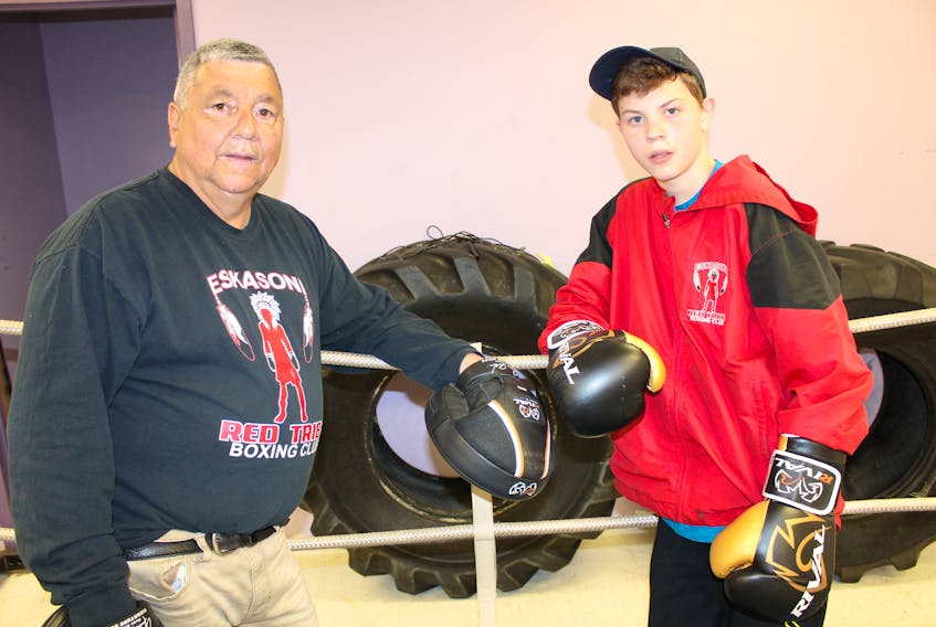 Fourteen-year-old Ethan Marshall of Eskasoni, right, will fight in the main event against Shane O’Brien of Ireland in a fight card hosted by the Red Tribe Boxing Club in Eskasoni on Thursday. Also shown is Red Tribe head coach Barry Bernard.