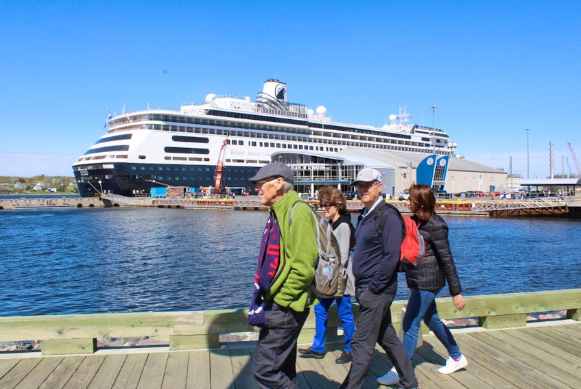 Passengers from the Holland America Line cruise ship Zaandam take a stroll on the Sydney boardwalk on Wednesday. The 21st annual Cruise Canada New England Symposium is taking place in Membertou this week and wraps up today. The conference tackled on Wednesday what improvements can be made to port infrastructure, cruise excursions and how all community partners need to work together to make for an exceptional destination. CHRIS SHANNON/CAPE BRETON POST