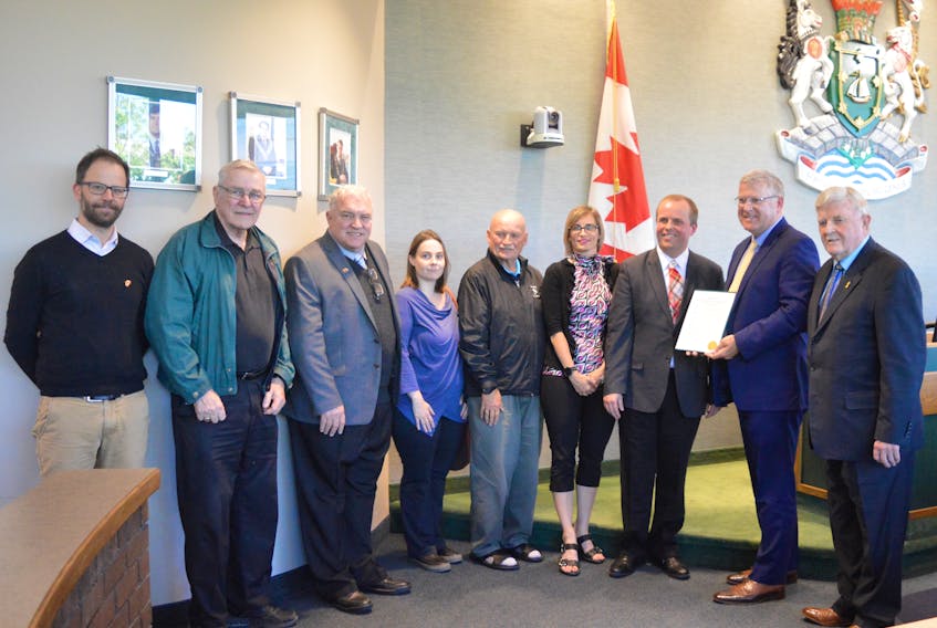 Members of Cape Breton’s Polish community attended a recent CBRM council meeting at city hall, where a resolution was passed making the municipality a partner city of Walbrzych, Poland. Pictured from left: Andrew Parnaby, associate dean of CBU’s School of Arts and Social Sciences, Bernie LaRusic, Barry Sheehy, Alison Etter, Frank Starzomski, Krista Ann Starzomski, Tom Urbaniak, Mayor Cecil Clarke and District 12 Coun. Jim MacLeod.