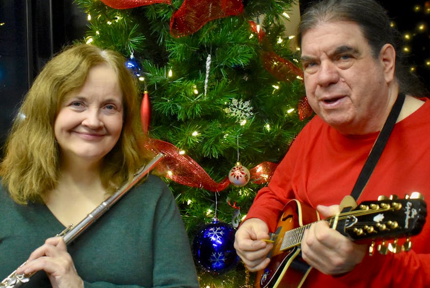 Elizabeth Patterson, left, and David Burke are ready to celebrate the holiday season with their new album, "Yuletide," which will be launched at the McConnell Library in Sydney, Friday at 7 p.m.