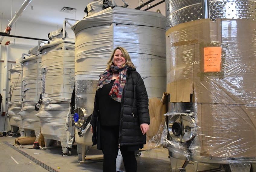 Jill McPherson, the local entrepreneur behind the Island Folk Cider House, shows off the giant tanks that will be used in the facility's on-site production process. McPherson said she expects the cidery, located in the former St. George's Church hall building and across Nepean Street from the former Holy Angels school and convent, to open its doors to the public in the spring. The operation has already received approval to serve its products on the premises and is now asking CBRM council to amend its bylaws to allow for the sale and consumption of local beer and wine.