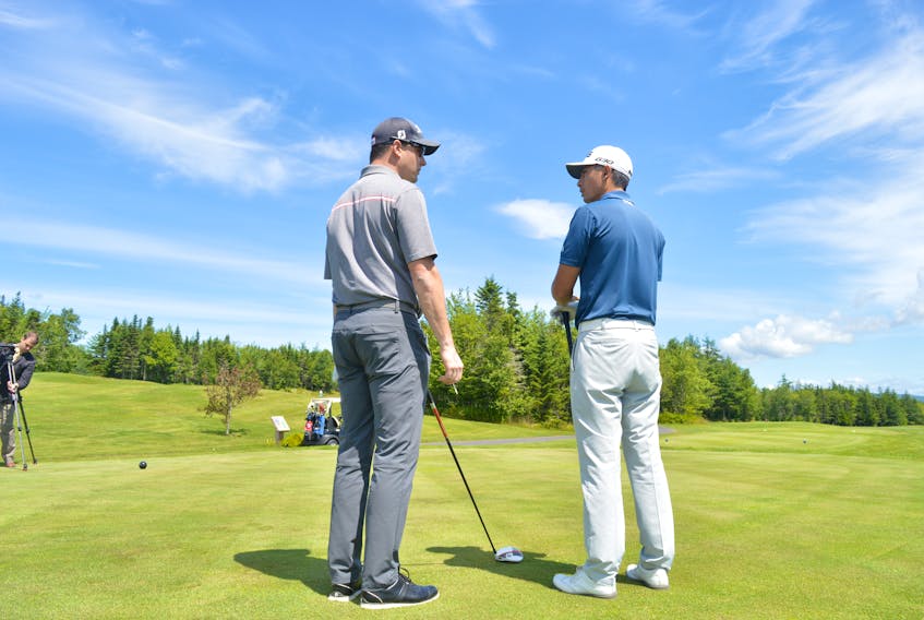 From left, Scott Pritchard, director of tournament business affairs with MacKenzie Tour PGA Tour Canada chats with PGA pro golfer Peter Campbell in this Cape Breton Post file photo at Bell Bay in Baddeck during a media day for the 2016 Cape Breton Open. The planned 2018 edition of the Cape Breton Open was cancelled after an unnamed sponsor dropped out.