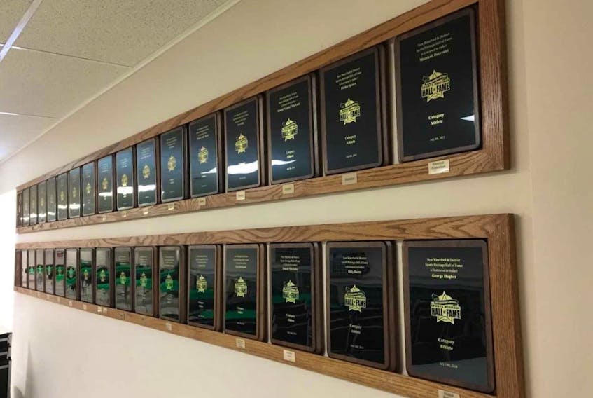 Plaques honouring inductees of the New Waterford and District Sport Heritage Hall of Fame are shown hanging in the Gillis/Watts room of the New Waterford and District Community Centre. Seven individuals and teams will be inducted into the local hall of fame during a ceremony on July 16 at the Knights of Columbus in New Waterford.