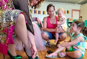 Halifax-based drag queen Miranda Wrights compared shoes with three-year-old Emelia Gouthro alongside her mother Leigha Gouthro and nine-month-old sister Dani Gouthro.