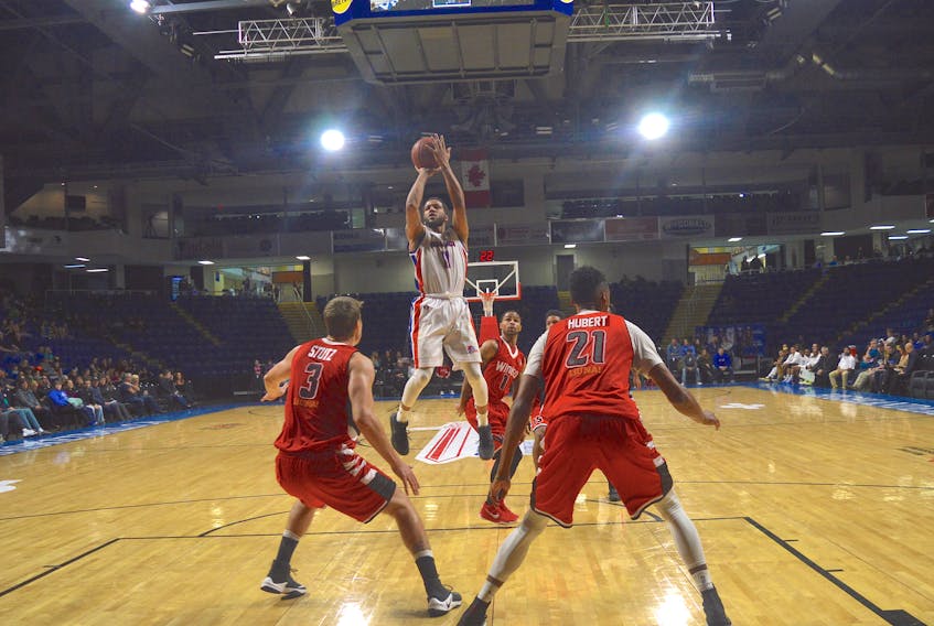 Duke Mondy of the Cape Breton Highlanders hits a jump shot against the Windsor Express in National Basketball League of Canada action at Centre 200 on Wednesday night. The Highlanders hung on for a 106-105 win. Cape Breton Post Photo