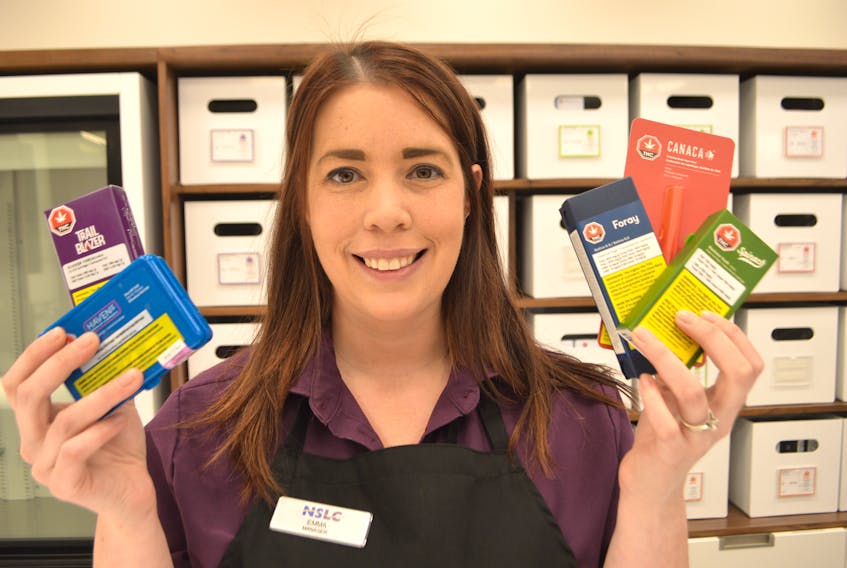 Emma Spawn, manager at the Nova Scotia Liquor Corp.'s Sydney River store, shows a variety of vape products now available at the 12 NSLC stores that sell cannabis products across the province.