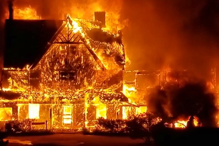 The renowned Inverary Resort, an iconic Baddeck property offering lodging and entertainment, was dealt a harsh blow after an early Thursday morning fire quickly consumed the main lodge, reducing it to a pile of smouldering rubble by sunrise. The above photo of the main lodge on flames early Thursday morning is from the Firefighters of Nova Scotia Facebook page.